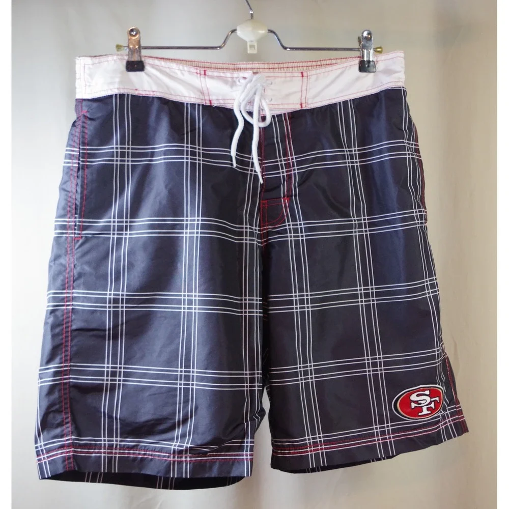 NFL Team Apparel Men's Large San Francisco 49ers Plaid Board Shorts